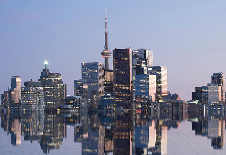 Toronto Skyline with reflection in the water off the lake